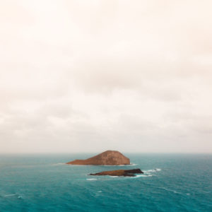 Wandbild Kleine Insel im Ozean
