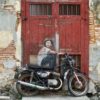 Wandbild-Graffiti-von-einem-Mann-auf-dem-Motorrad