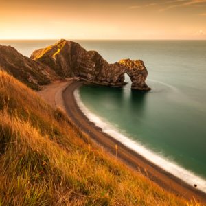 Wandbild-Wunderschoener-Sonnenaufgang-an-den-Klippen-von-England